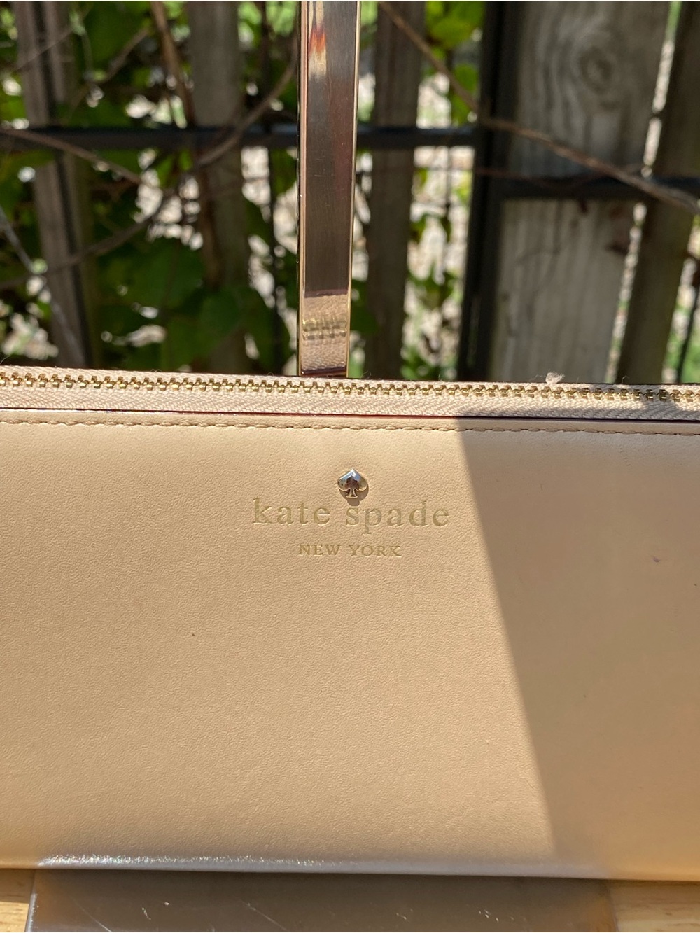 kate spade Cream Leather Wristlet Clutch with Gold Hardware